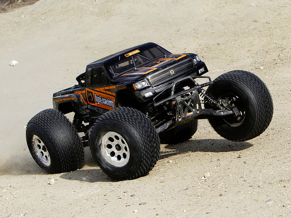 Автомобиль HPI Savage XL Octane 1:8 монстр-трак 4WD бензин 2.4ГГц черно-оранжевый RTR Фотография 2