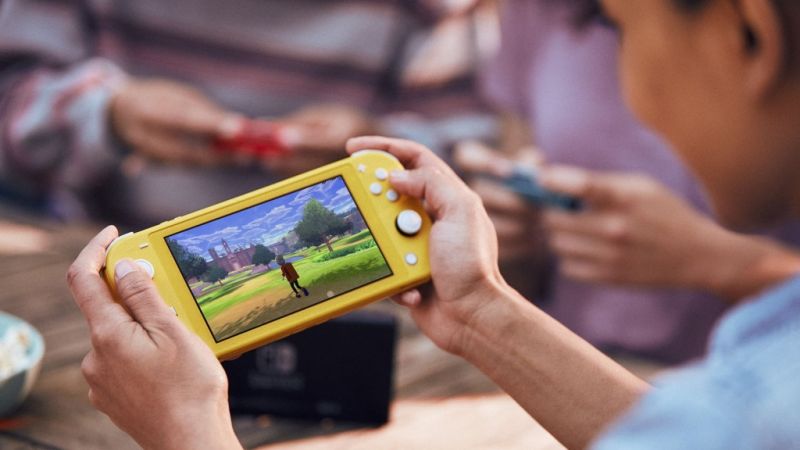 Nintendo Switch Lite Yellow + The Legend of Zelda Breath of the Wild Фотография 6
